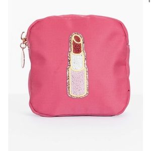 NWT beauty lipstick patch mini travel bag.